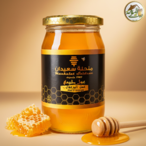 Miel d’orange naturel en pot, couleur dorée, texture fluide et arômes délicats d’agrumes